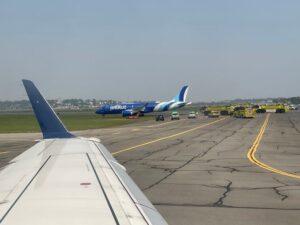 Plane skids off runway into grass while landing in Boston
