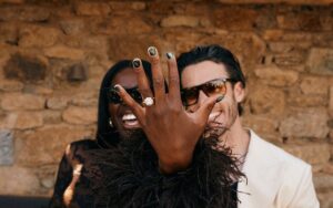 AJ Odudu confirms engagement to mystery man as she packs on PDA